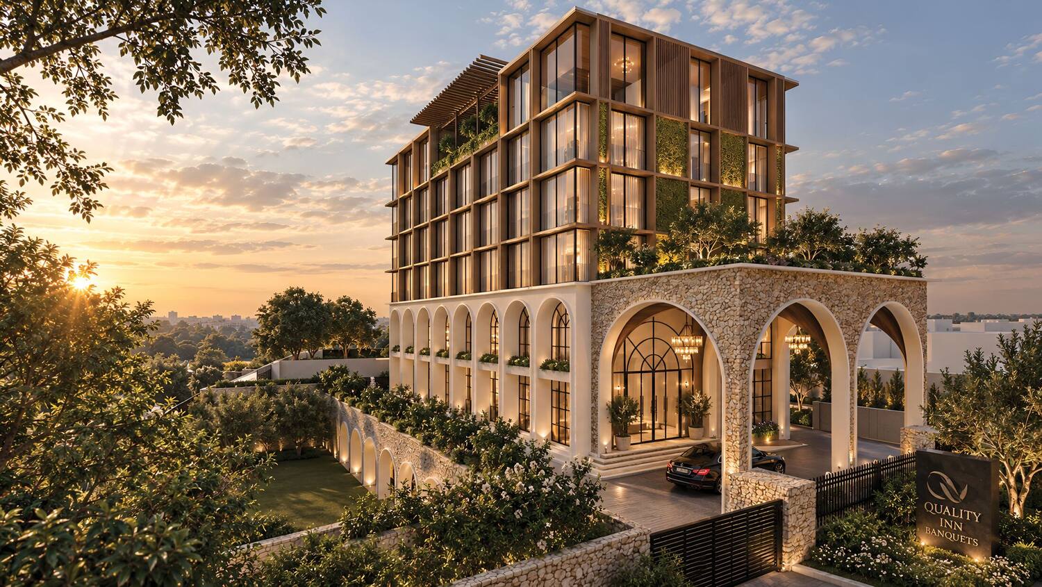 Quality Inn Tamsa at dusk: a timber-framed hotel rising above a stone arcade